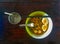 Thai style chopped pork noodle garnished with pork balls, half-cutted boiled egg