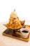 Thai tea shaved ice topped with whipped cream and white bread by