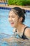 Thai teen girl in a swimming pool