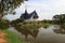 Thai temple reflecting water  in the muangboran museum are a popular tourist destination