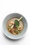 Thai tom yam kung spicy soup with prawns on white background