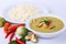 Thai traditional and popular food, Thai chicken green curry intense soup on white background.