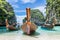 Thai traditional wooden longtail boat and beautiful beach in Thailand