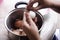 Thai woman peeling boiled egg for cooking