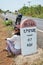 Thai woman portrait with Milestone go to DONTALAD at Pakse in Champasak, Laos