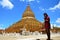 Thai woman praying of Shwezigon Pagoda or Shwezigon Paya in Bagan, Myanmar.