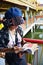 Thai woman reading guide book at Botahtaung Pagoda i