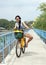 Thai woman riding a bike