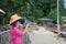 Thai woman standing on the bridge at Fishing Village Koh Phithak Island