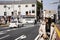 Thai women walk on footpath beside road between walking go to Naritasan Omote Sando or Narita old town at Chiba in Tokyo, Japan