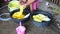 Thai women washing and clean clothes after tie batik dyeing