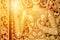 Thai woodcraft golden art god pattern at temple door Buddhist religion culture pattern for background