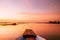 Thai wooden boat bow travel in peaceful Nong Harn lake - Udonthani, Thailand. Famous red lotus lake in winter