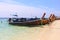 Thai wooden boat on sea beach at Lipe island