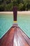 Thai wooden head longtail boat heads toward