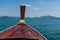 Thai wooden head longtail boat heads toward