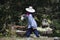 Thai worker carries fish eggs fruit and vegetables