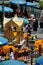 Thai worshippers give offerings and seek blessings at four headed Erawan shrine Bangkok Thailand