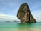 Thailand beach with limestone cliff island