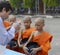 THAILAND,CHIANG MAI-MARCH 25,2013: Young novice Monks collect of
