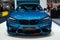 Thailand - Dec , 2018: Blue color BMW M2 expensive car , close up front view . presented in motor expo Nonthaburi Thailand