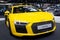 Thailand - Dec , 2018: yellow color Audi R8 expensive super sports car , close up front view . presented in motor expo Nonthaburi