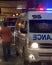 Thailand - FEBRUARY 20, 2015: Ambulance at night responding to an emergency situation at Chinatown parade during Chinese new year