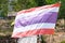 Thailand flag on the longest wooden bridge in Pai