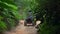 THAILAND, KOH SAMUI - FEBRUARY 25, 2019: Tourists Riding All-Terrain Vehicle also called ATV around Island