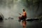 Thailand Little monk sitting on the creek or river in forest at