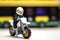 Thailand, May 8, 2017.closeup lego man riding dirt big bike on Blurred background. Lego minifigures are manufactured by The Lego