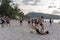 Thailand, Phuket, March 30, 2020: men and teenage girls play soccer and Rugby with a ball on the beach. sharp fight and duels, a