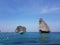 Thailand rocks in a see with ships