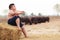 Thailand Rural Traditional Scene, Thai farmer shepherd boy sitting, tending buffaloes herd in the farm. Thai Upcountry Culture