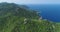 Thailand\'s island aerial: mountains, jungle at ocean bay. Mesmerizing Thai landscape with green hill