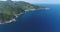 Thailand\'s island, ocean coast aerial landscape view: mountains with green trees, rocks shore, beach