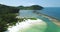 Thailand\'s Malibu Beach aerial: boats at sea coast shallow water near white sand. Paradise Thai isle