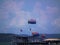 Thailand sky person parachute ship sea