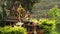 Thailand Spirit House ,San Phra Phum, Rean Tevoda, Pteah Phum, in Green Mountains of Phuket Island. Rock and Grass.