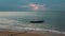 Thailand sunset time-lapse of the long-tail boat at a beach. Boat moored in the beach time lapse.
