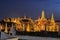 Thailand temple travel Grand palace Emerald Buddha Wat Phra Kaew at twilight Blue Sky from traffic in Bangkok, Thailand