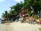 Thailand tropical sand beach hut with clourful furniture trees