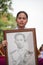 Thailand women,Thai girl were holding pictures of the king of Thailand