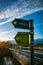 Thame Valley Walk arrow sign by the street, countryside footpath direction, signpost directing trail from Shabbington to