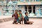 THANJAVOUR, INDIA - FEBRUARY 14: An unidentified boys were sitting on the roof of the Brihadeeswarar Hindu Temple. India, Tamil N