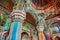 Thanjavur, Tamil Nadu, India - The high arches artworks and colorfully painted wall murals durbar hall Maratha Palace