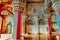 Thanjavur, Tamil Nadu, India - The high arches artworks and colorfully painted wall murals durbar hall Maratha Palace