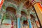 Thanjavur, Tamil Nadu, India - The high arches artworks and colorfully painted wall murals durbar hall Maratha Palace