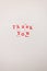 Thank you, gratitude concept, beautiful minimalistic card, vintage red letter stamps on white background. vertical orientation