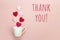 Thank you message and coffee cup with hearts coming out of it o